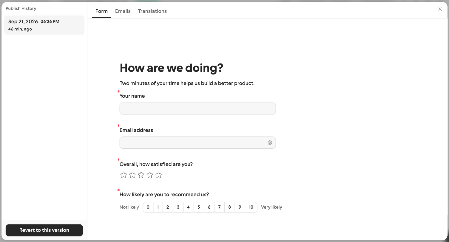 The Publish History dialog: published versions with their timestamps on the left, a preview of the selected version with Form, Emails, and Translations tabs, and the Revert to this version button.